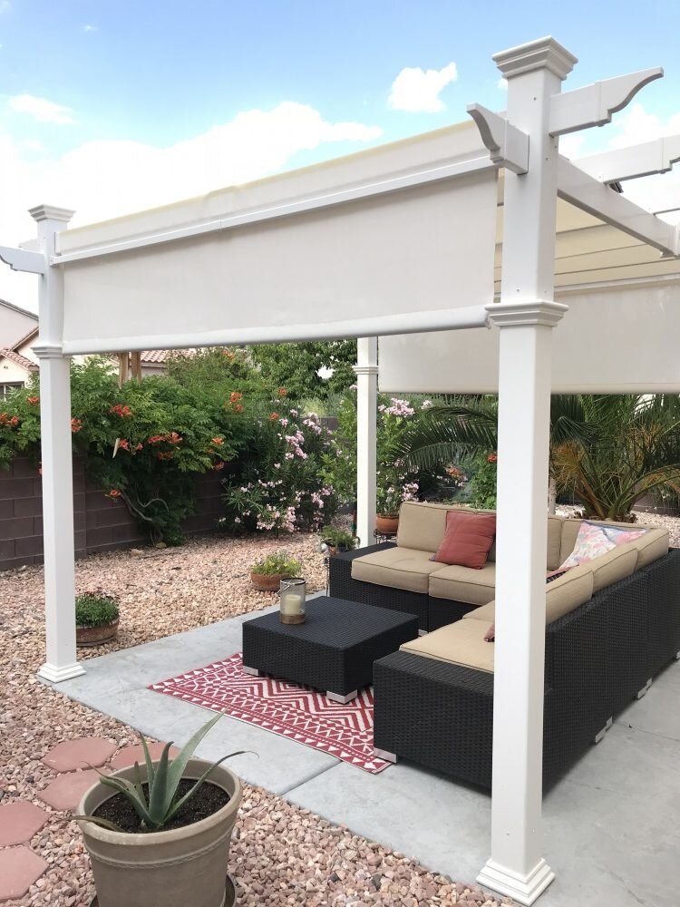 Vita 10 ft. x 10 ft. White Vinyl Deluxe Pergola with Base Moldings and Canvas Weave